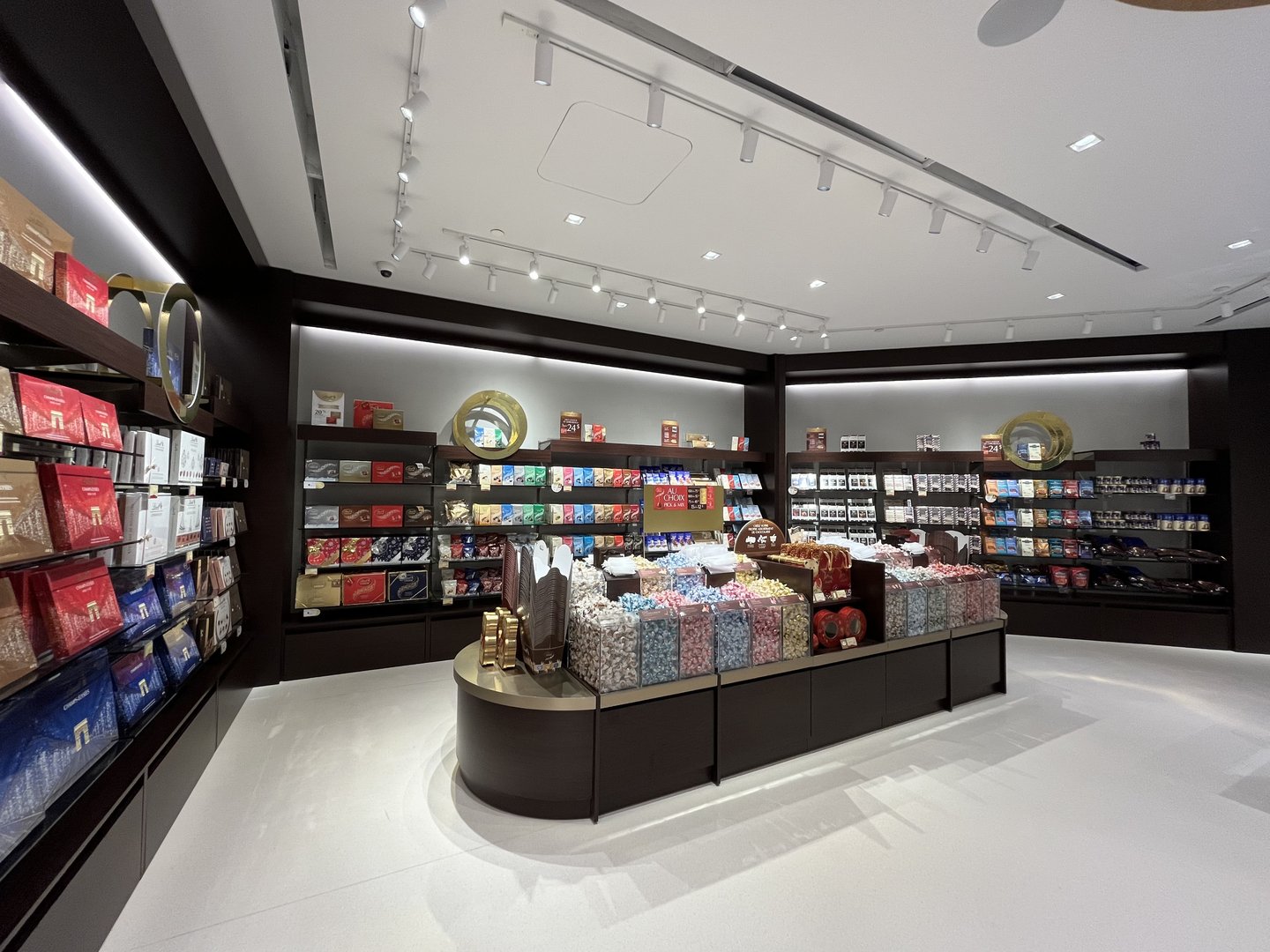 The second Pick & Mix section at the back of the redesigned Lindt store, with a curved island of Lindor truffles