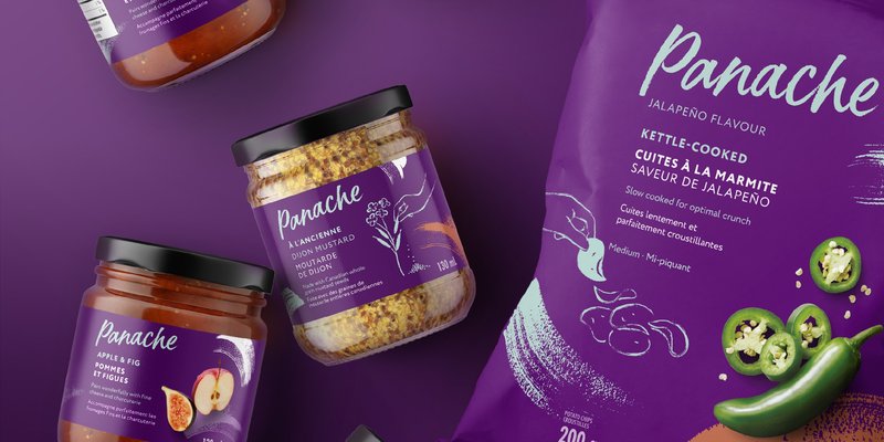 Panache jars of chutney and mustard beside a bag of Panache jalapeno kettle cooked chips on purple