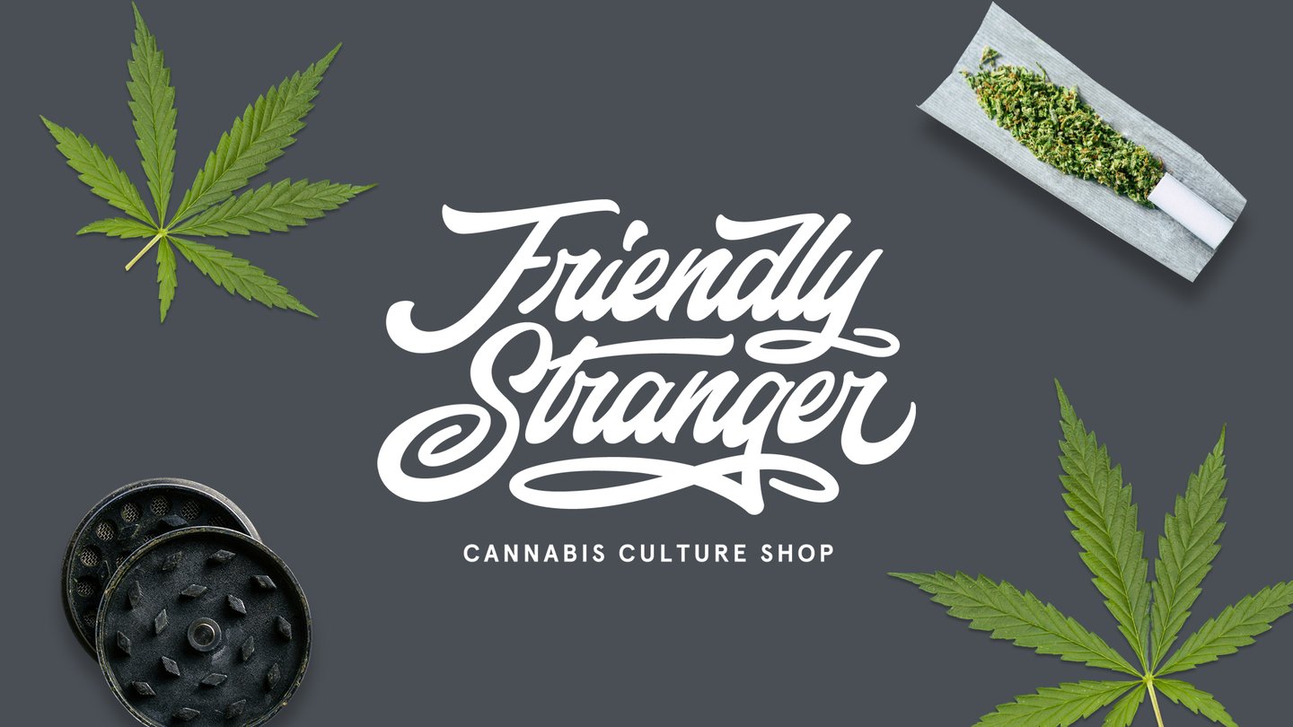The Friendly Stranger Cannabis Culture Shop logo on dark grey, surrounded by cannabis leaves, a grinder and a rolling paper