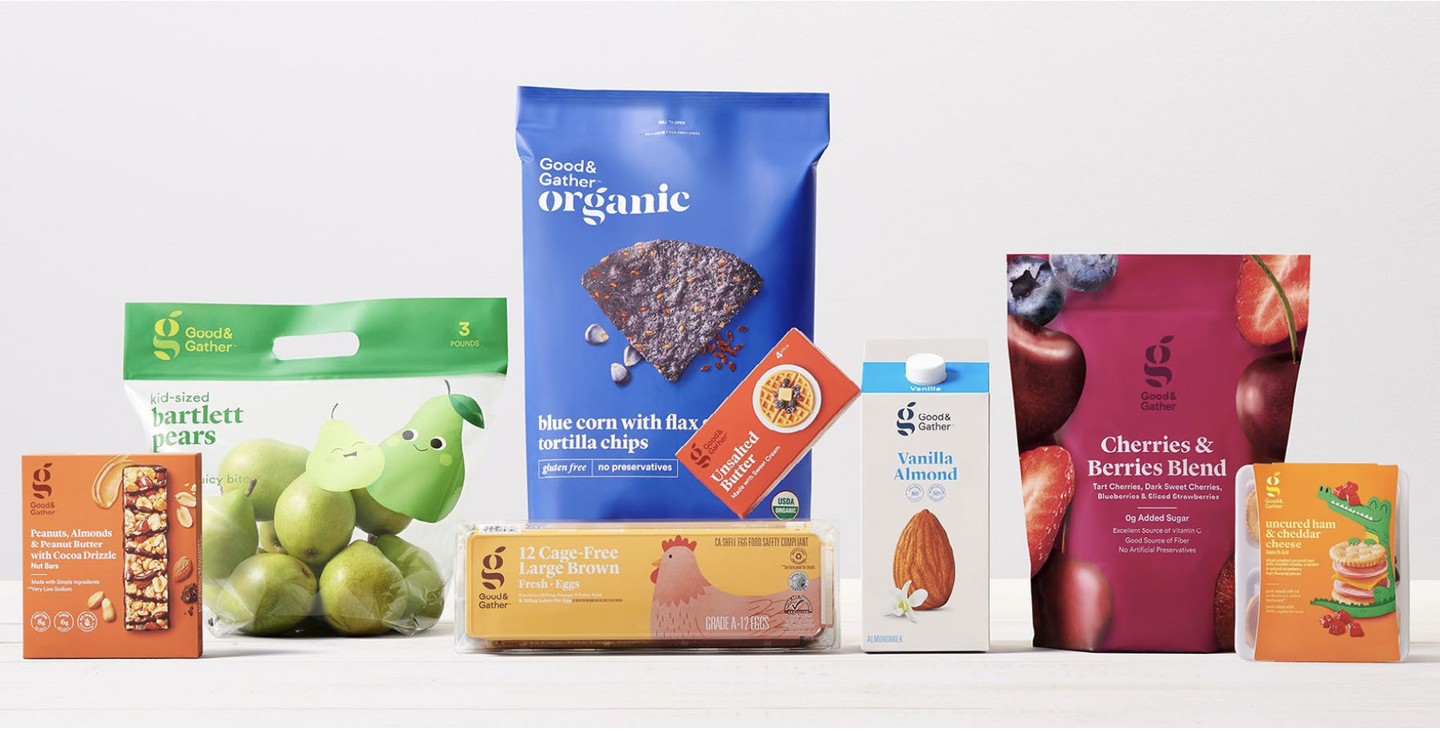 Good & Gather packaging: organic blue corn tortilla chips, bartlett pears, cherries and berries blend, vanilla almond milk and snack bars