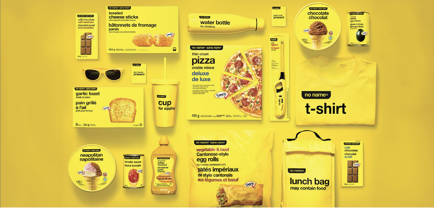 A flat lay of No Name products on yellow: cheese sticks, a water bottle, pizza, sunglasses, garlic toast, a cup, a t-shirt, egg rolls and a lunch bag