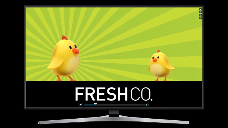 A still from the FreshCo TV spot on a television: two yellow chicks on a green sunburst above the FreshCo logo