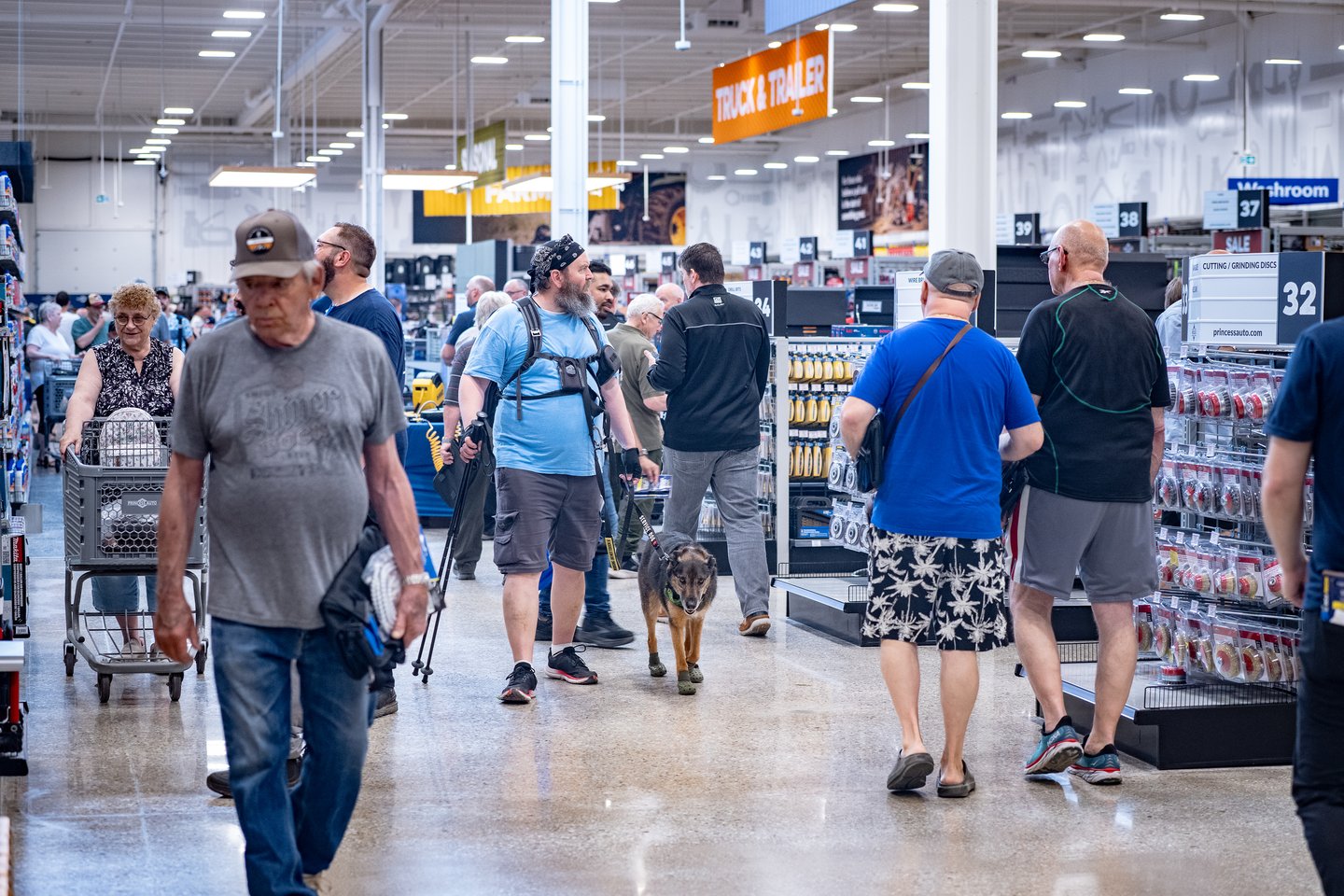 Crowds of shoppers in the aisles at the Princess Auto flagship grand opening