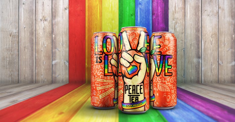 Three Peace Tea Peach Love Pride cans spelling 'Love is Love' with peace-sign hands, on rainbow-painted boards