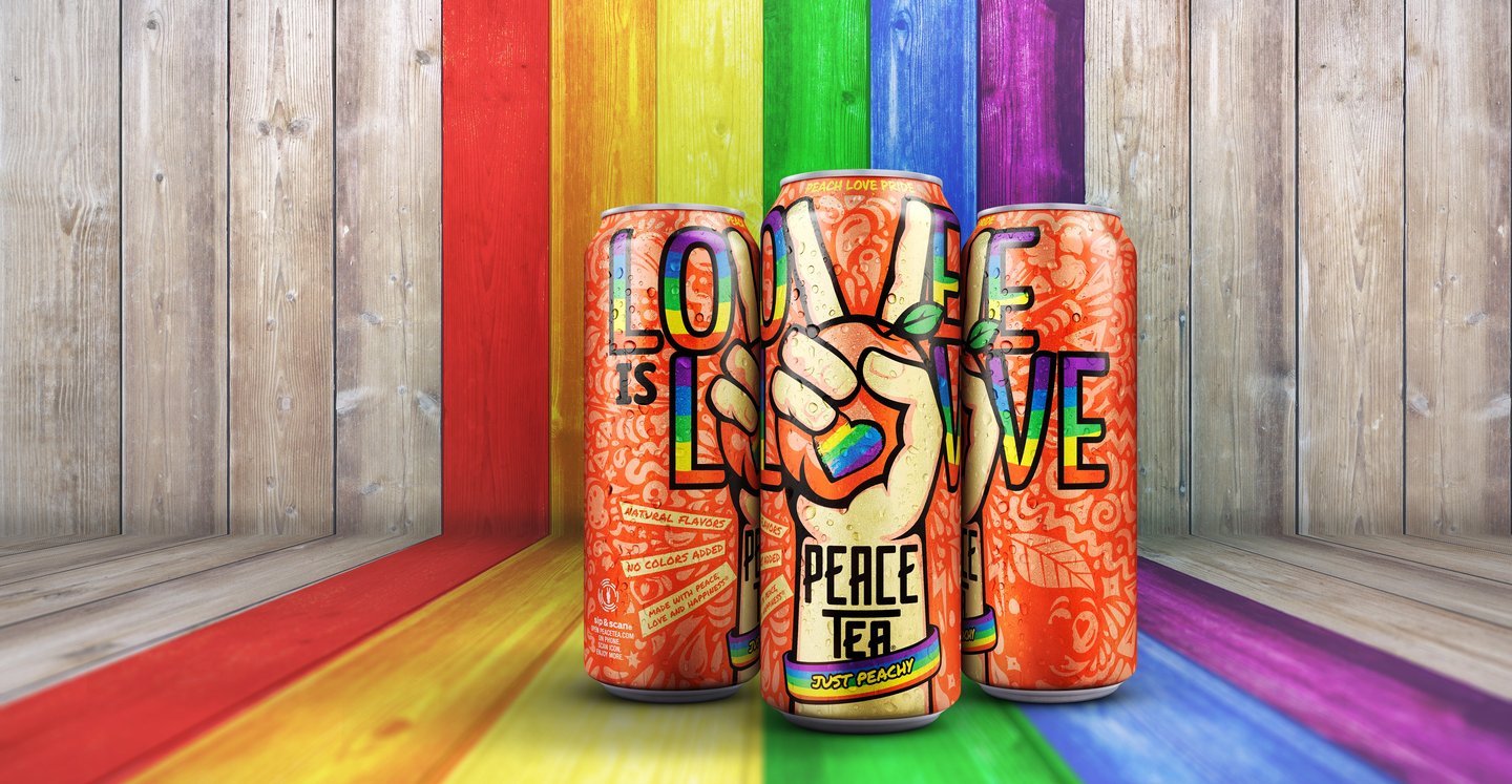 Three Peace Tea Peach Love Pride cans spelling 'Love is Love' with peace-sign hands, on rainbow-painted boards