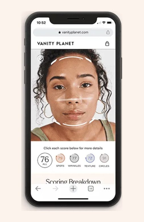 A skin-scanning app on a phone scores a shopper's skin for spots, wrinkles, texture and circles