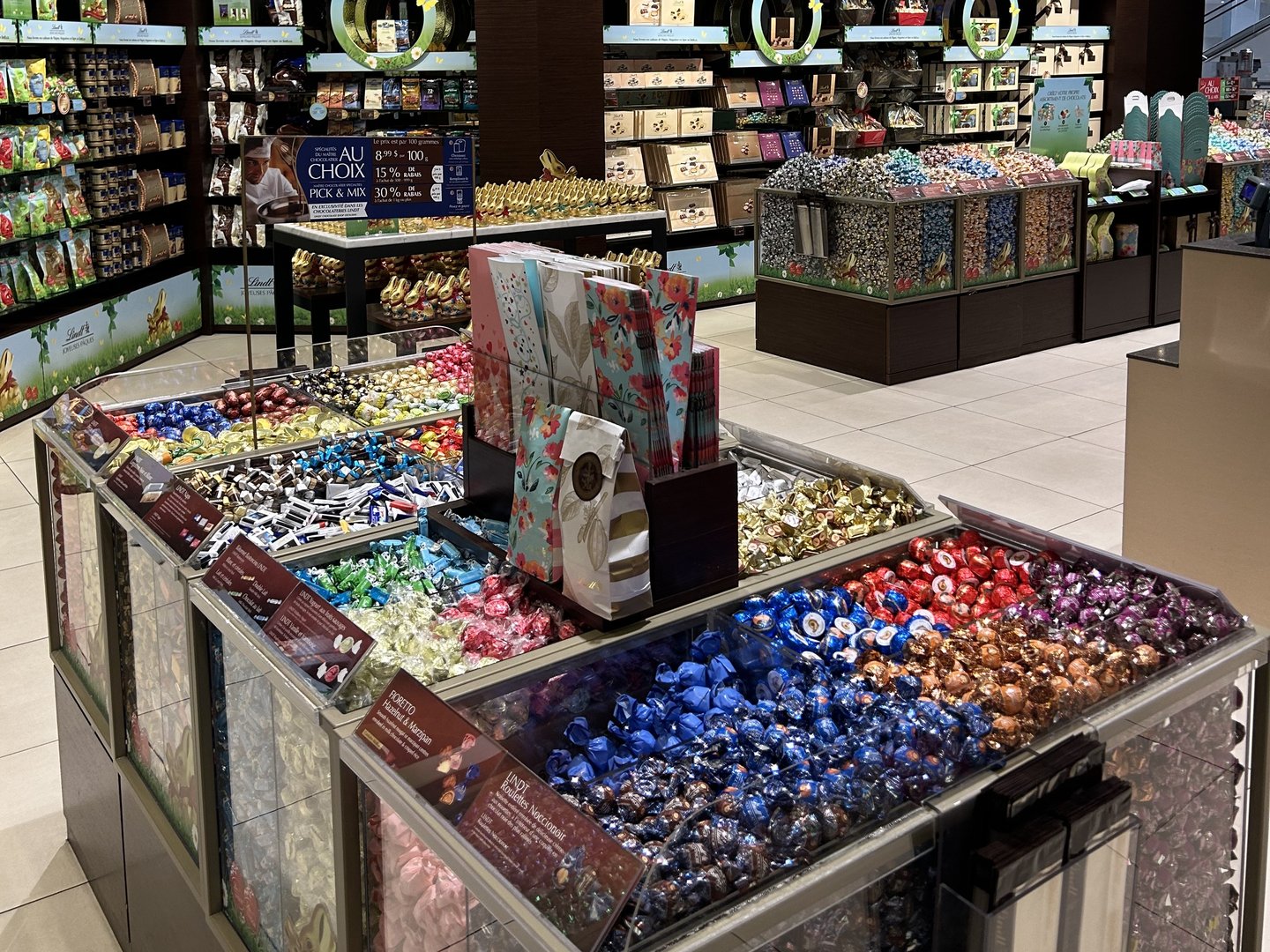 The old Lindt store: Lindor bins and gift displays crowded together on the floor