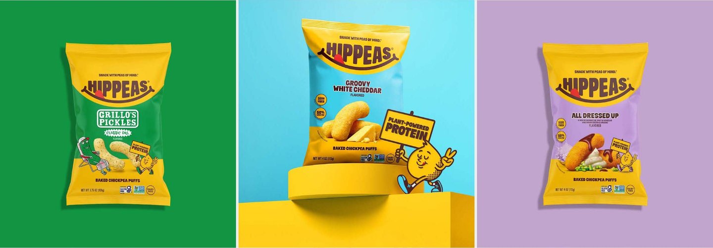 Hippeas chickpea puff bags in chili & pickles, white cheddar and all dressed up flavours on green, blue and lilac panels