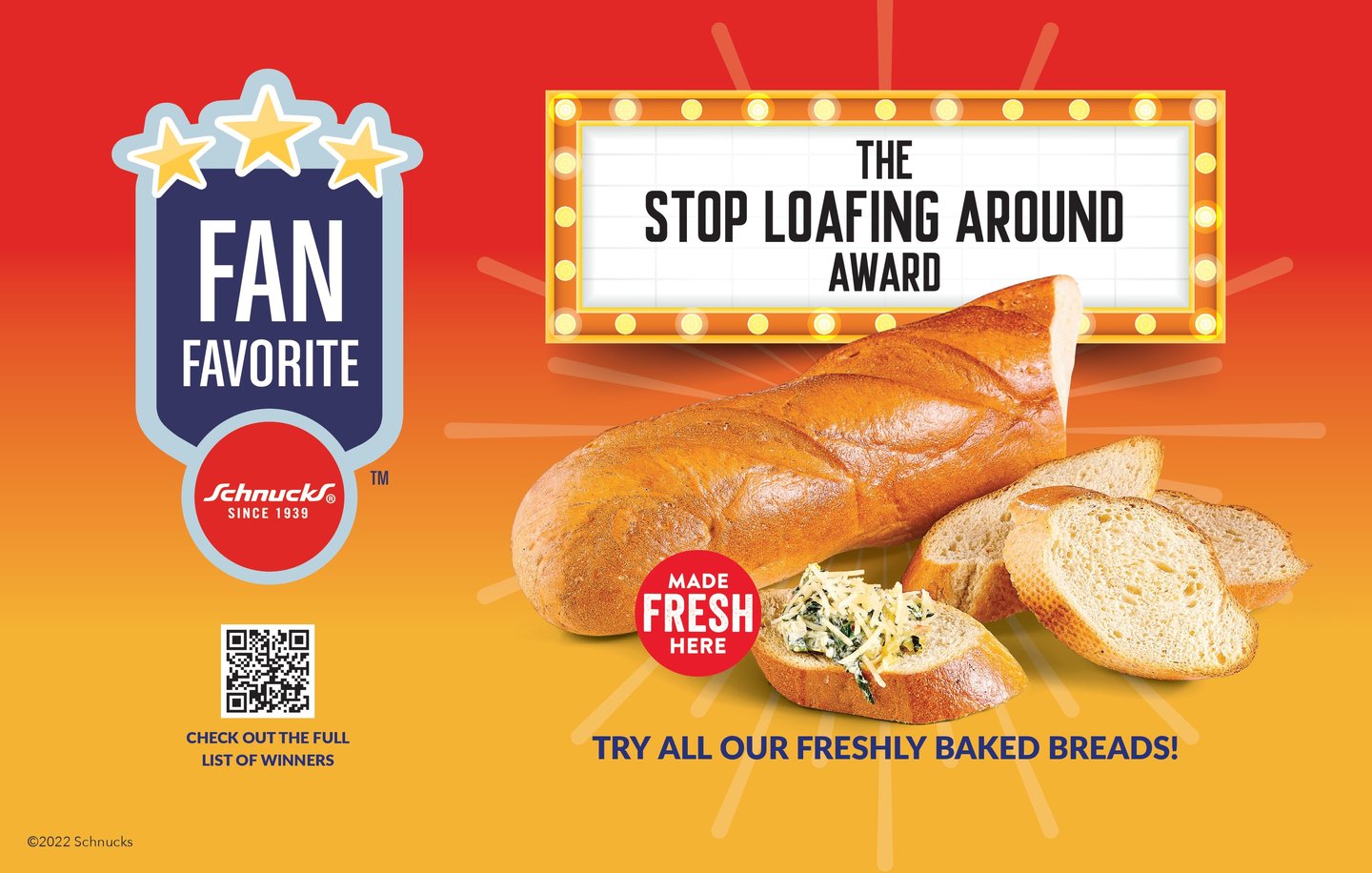 A Schnucks Fan Favorite sign: 'The Stop Loafing Around Award' on a marquee above a freshly baked French loaf