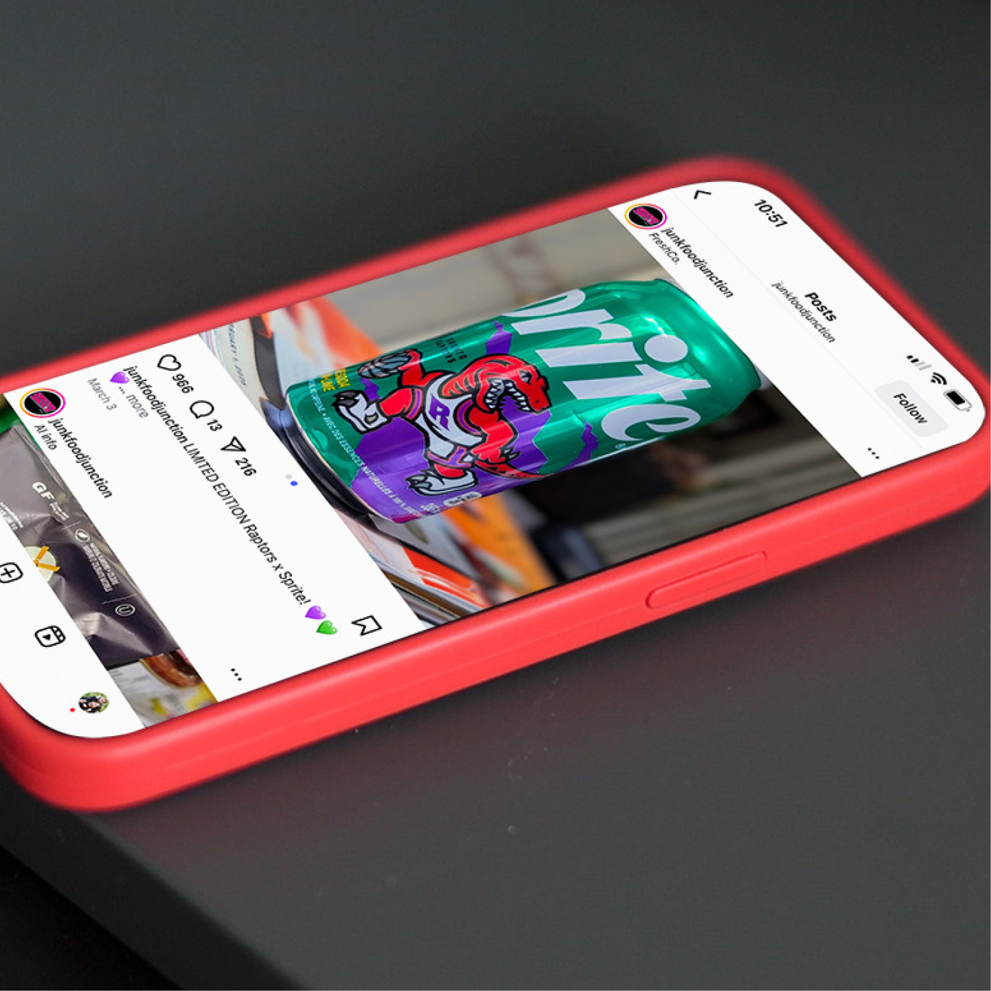 A phone in a red case showing an Instagram post of the Sprite Raptors can