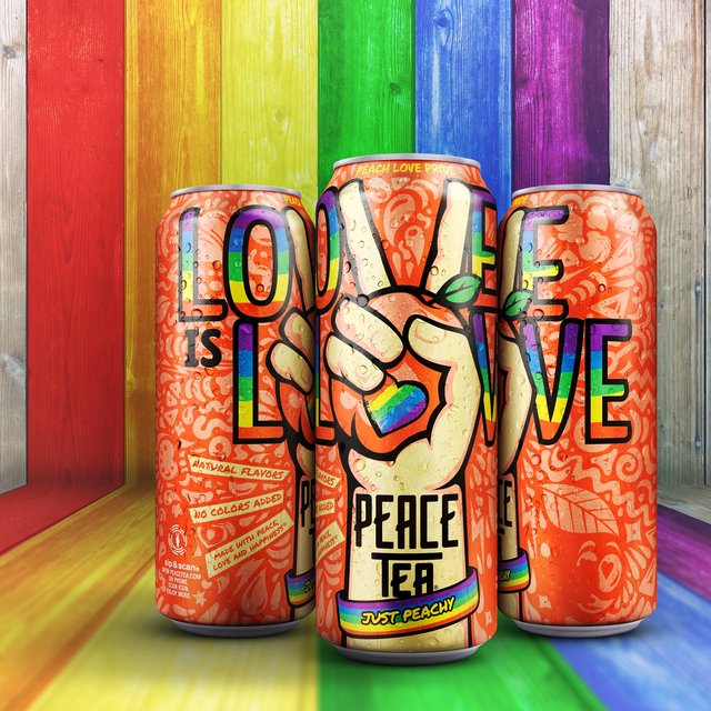 Three Peace Tea Peach Love Pride cans, whose peace-sign hands spell 'Love is Love', on rainbow-painted boards